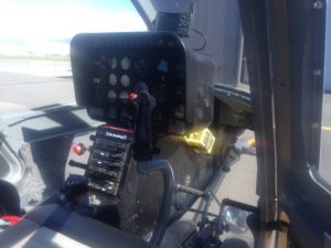 Repairing the locks on a Bell Helicopter.