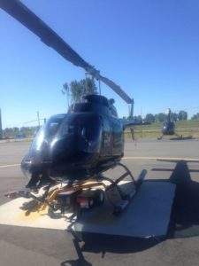 Repairing the locks on a Bell Helicopter.